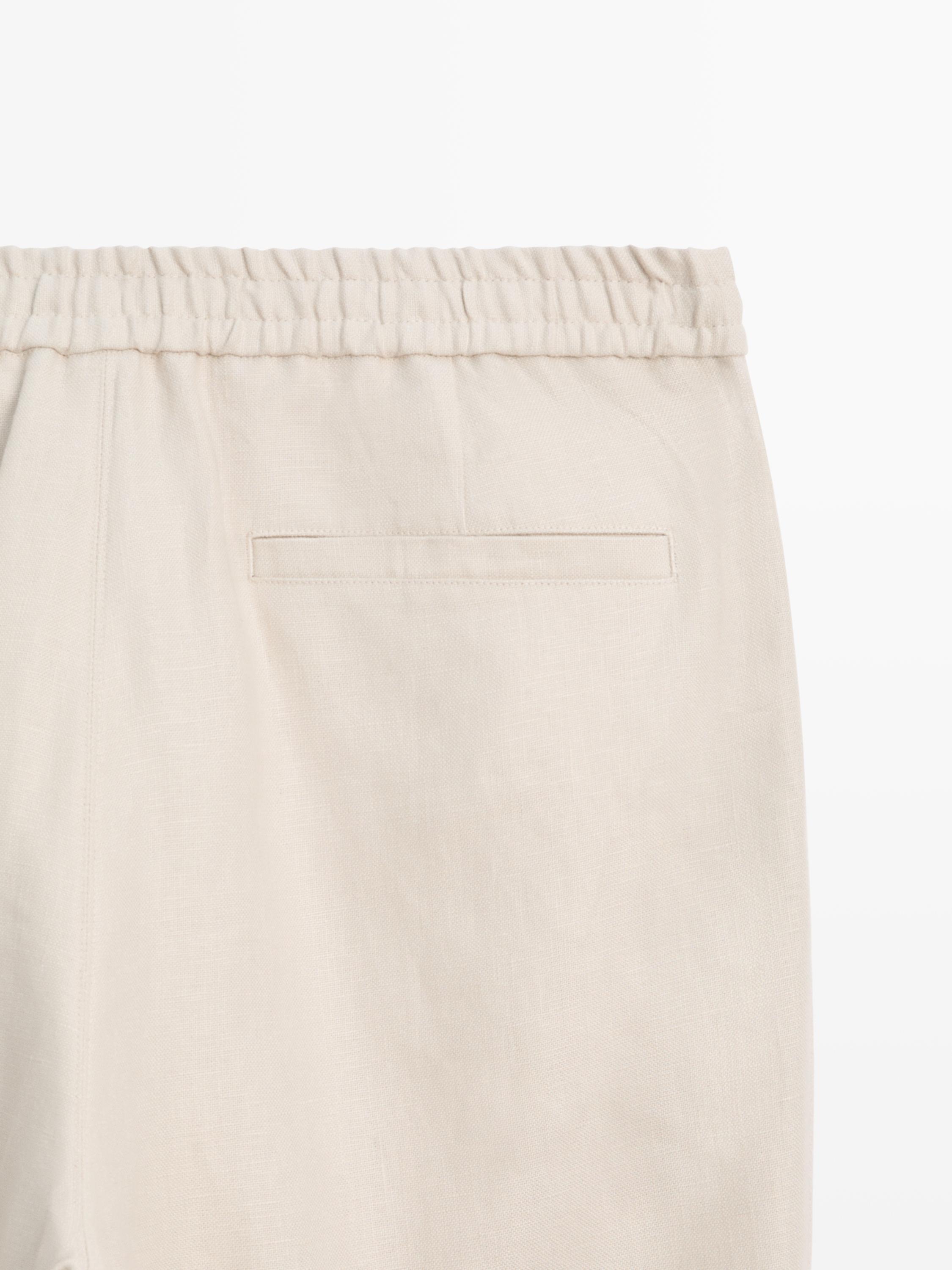 Total look linen trousers with waist detail